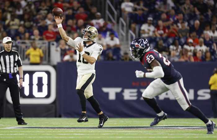 New Orleans Saints quarterback Ian Book (16) attempts a pass against the Houston Texans. Mandatory Credit: Troy Taormina-USA TODAY